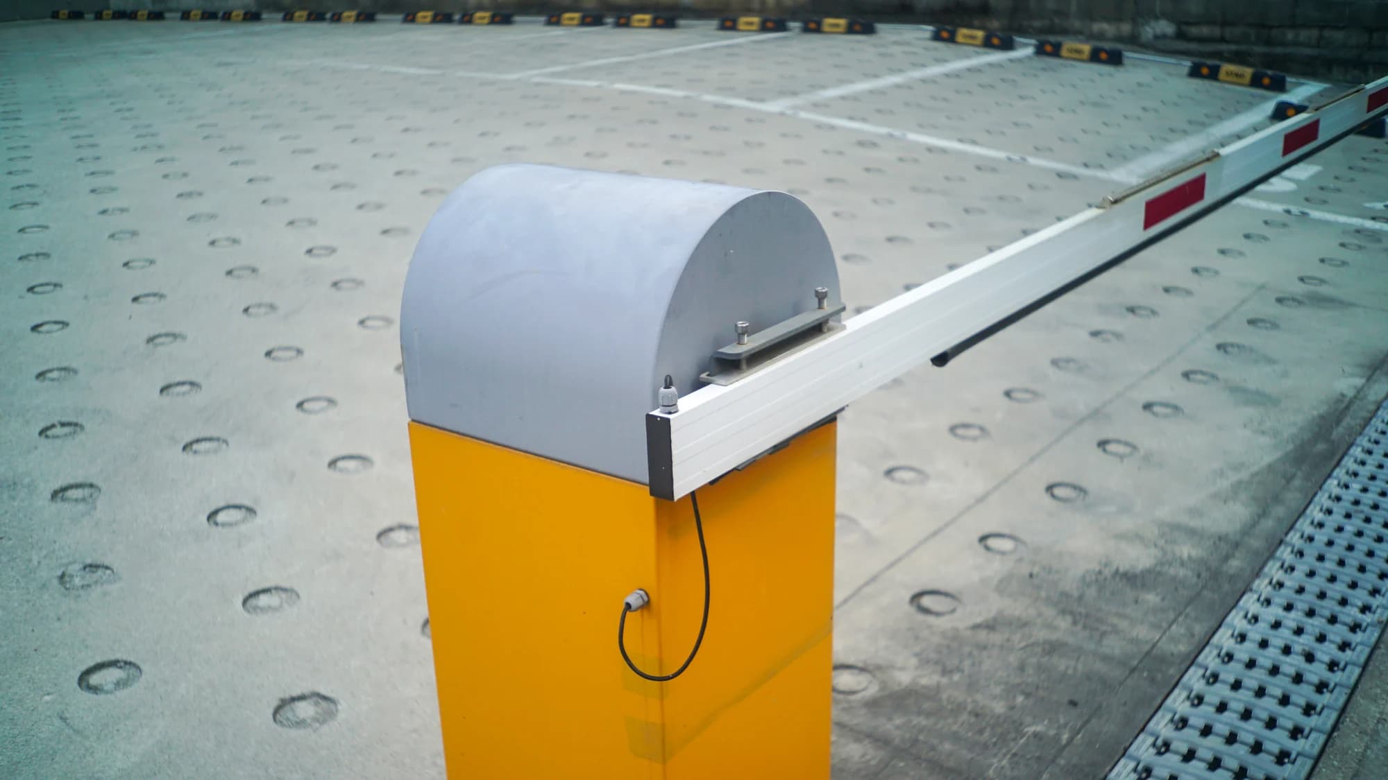 Automatic boom barrier at a parking entrance